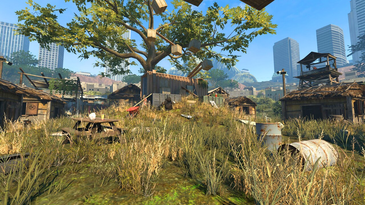 The Only Up starting area with a tree, crates and city skyline